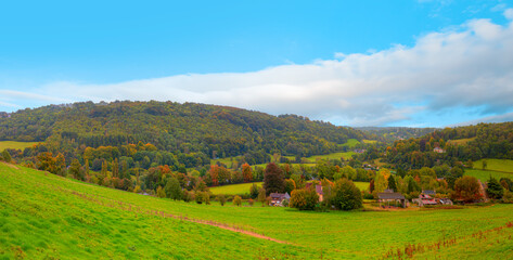 Panorama of the countryside in Wales with green field - View of green fields and farmlands in rural North Wales