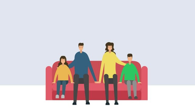 Young family sitting on couch while watching TV