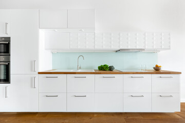 Modern kitchen with white and wood