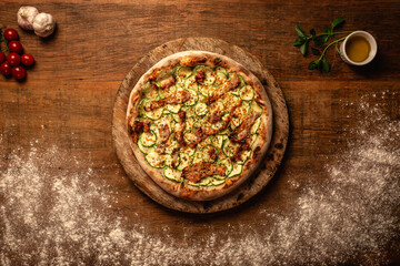 Top down pizza on wooden table for restaurant menu