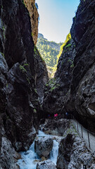 Clear water streams through gorge