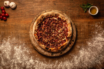 Top down pizza on wooden table for restaurant menu