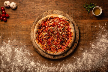 Top down pizza on wooden table for restaurant menu