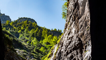 Clear water streams through gorge