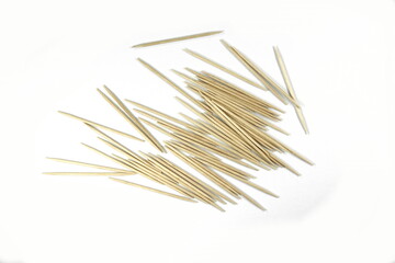 Wooden toothpicks isolated on white background.