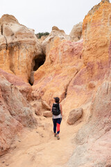 hiker in desert canyon