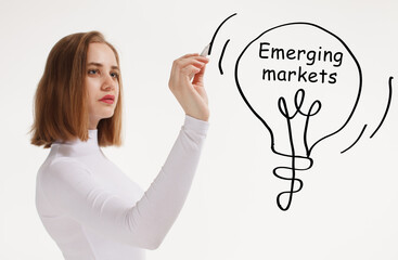 Business, technology, internet and network concept. Young businessman thinks over the steps for successful growth: Emerging markets