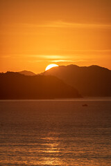 Naklejka premium Sunrise time at the beach