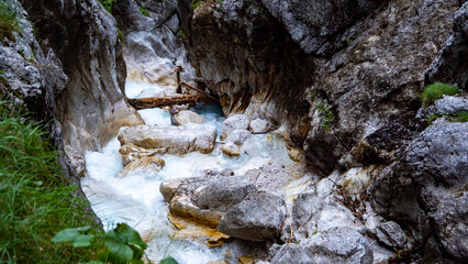 Clear water streams through gorge