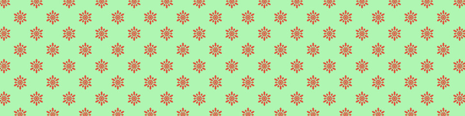 Christmas seamless pattern with snowflakes on pastel green background. Winter background with snowfall. Endless Christmas Pattern. Long wide banner.