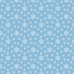 Christmas seamless pattern with snowflakes on pastel blue background. Winter background with snowfall. Endless Christmas Pattern