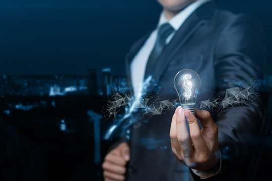 A lawyer or businessman showing light bulb burning inside the paragraph .
