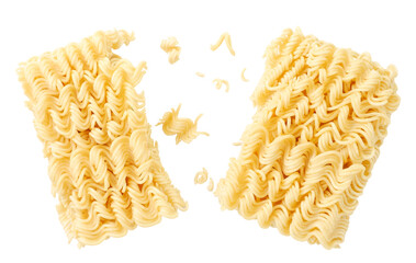 Instant noodles split in half on a white plate. Levitating noodles