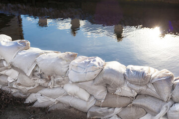Wall made of sandbags to protect the building behind it flood disaster flood prevention wall...