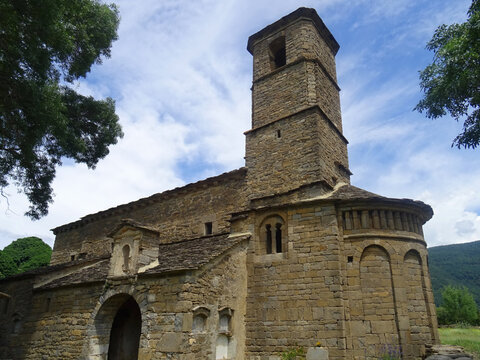 Mozarab and Romanesque Church of Santa Eulalia in the village of Sus&iacute;n. View of the semicircular apse and bell tower. 11th century.  Serrablo Region. Arag&oacute;n. Spain. 
