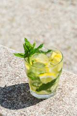 Classical cocktail mojito drink, outdoors