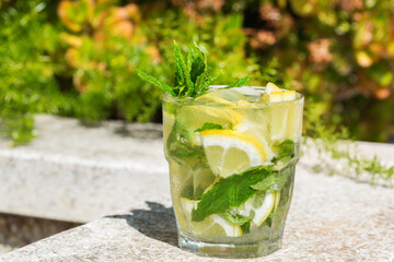 Classical cocktail mojito drink, outdoors