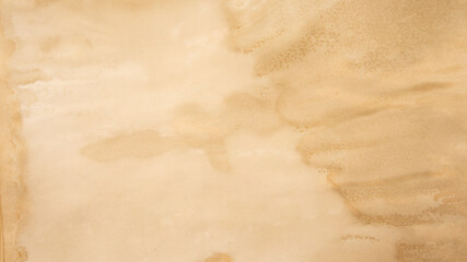 Old brown paper texture. Yellow autumn watercolor texture with abstract washes and brush strokes on the white paper background. Chaotic abstract organic design.