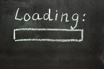 The loading process is shown in white on a chalkboard. Stop motion animation.