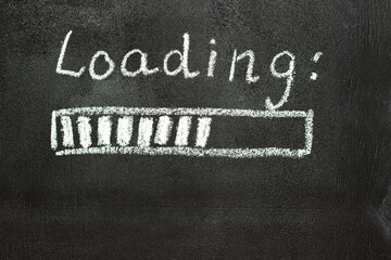 The loading process is shown in white on a chalkboard. Stop motion animation.