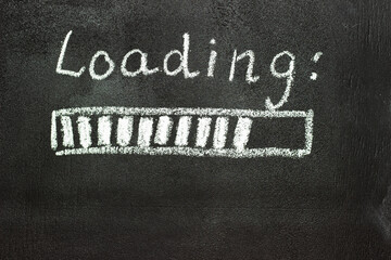 The loading process is shown in white on a chalkboard. Stop motion animation.