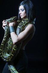 sexy brunette holding python