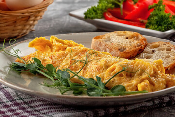 Fresh French omelet with fresh vegetables. Vegetarian food