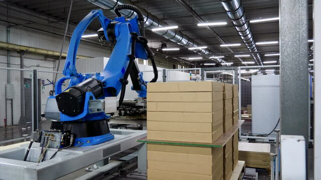 Furniture manufacturing. Furniture parts are packaged on an automated packaging line. 4K