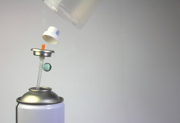 Deconstructed aerosol showing component parts