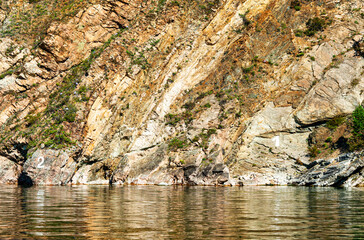 Shoreline of Lake Baikal in vicinity of the small touristy village of Listvyanka. Despite its modest size Listvyanka is one of the busiest tourist centers on Lake Baikal.