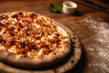 Delicious pizza in wood table