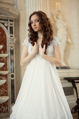 Fototapeta premium young victorian lady in white dress