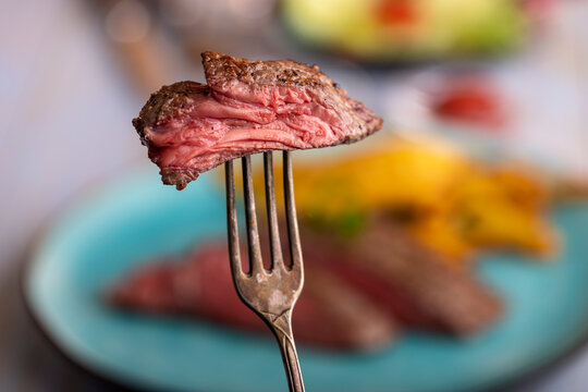 slice of steak on a fork