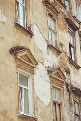 Fototapeta na wymiar Old facades of houses in the historic center of the European city