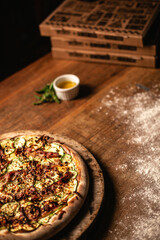 Delicious pizza in wood table