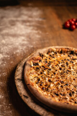Delicious pizza in wood table