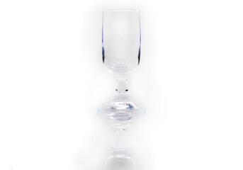 An abstract background image of an antique wine glass against white background
