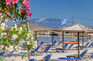 Picturesque sandy beach in Alykanas full of beautiful flowers and plants situated on the east coast of Zakynthos island, Greece.