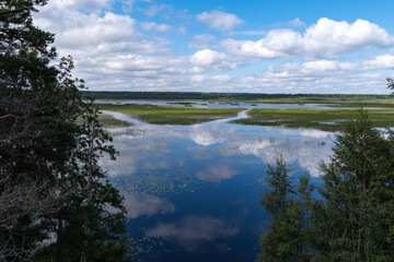 Cloud reflection in Okhotnichye (Hunters) Lake. Eco route in the 