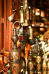 Fototapeta na wymiar Old Arabic metal pitcher and lantern