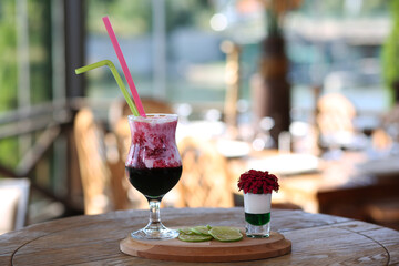 red cocktail on the table