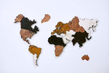 Wooden map of the world on white background 