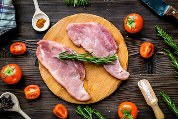 fresh meat in cooking steak concept wooden background top view
