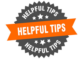 helpful tips round isolated ribbon label. helpful tips sign