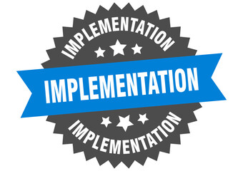 implementation round isolated ribbon label. implementation sign