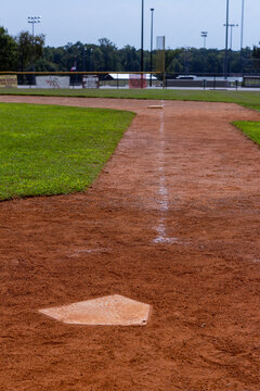 the baseline from home plate to first base on a baseball field in Montgomery, TX.