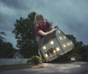 Woman picking up house
