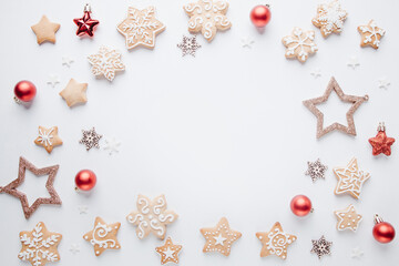 Christmas and New Year composition. Festive decorations and homemade gingerbread with copy space for text design. Holiday and celebration concept, greeting card or invitation mockup