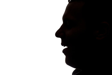 Silhouette of young man. Different face expressions isolated on white.Studio 