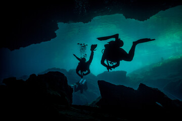 Two Cave Divers in a Cenote in Mexico